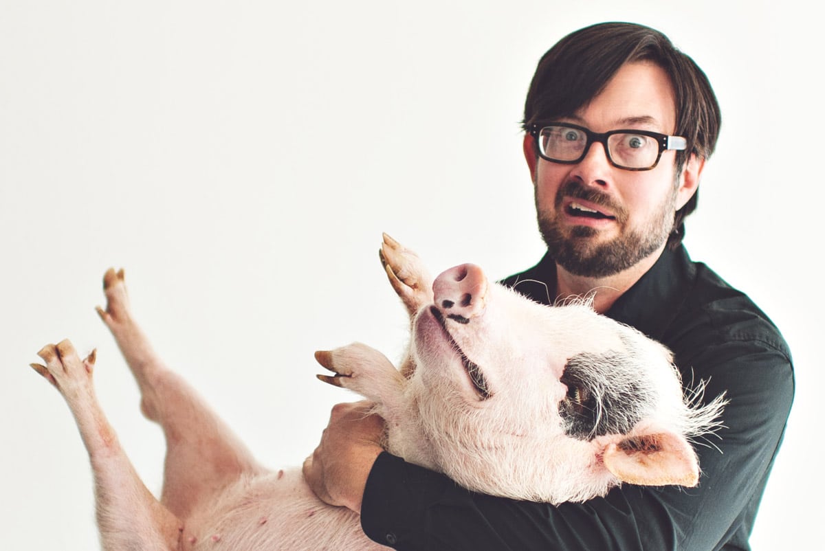 James Moore with Pig