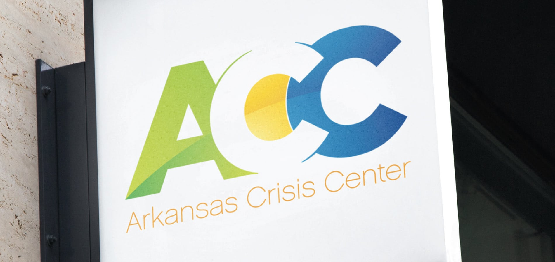 Arkansas Crisis Center Header Image of Sign Mockup