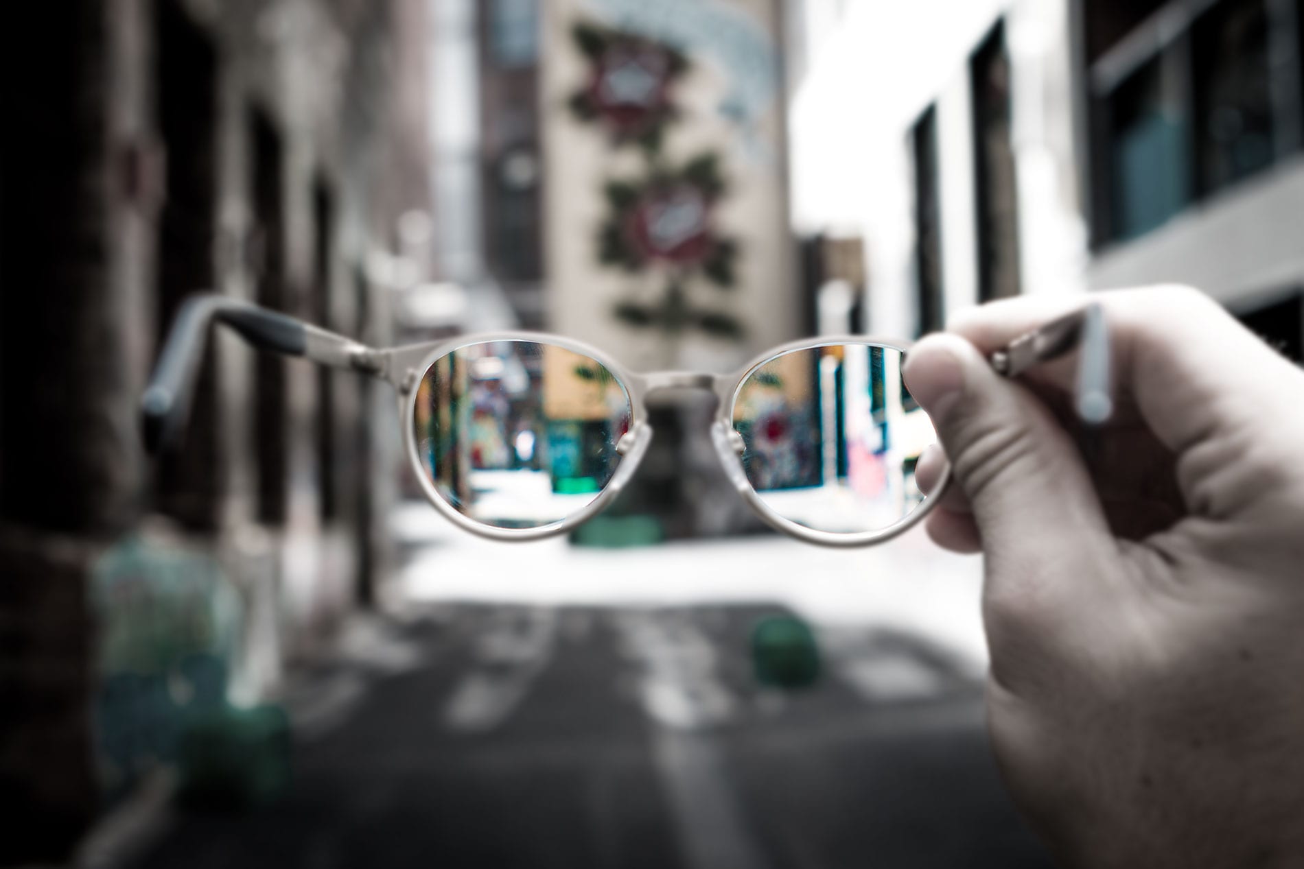 Blue Zoo ADA Compliance Header Image of someone looking through glasses.