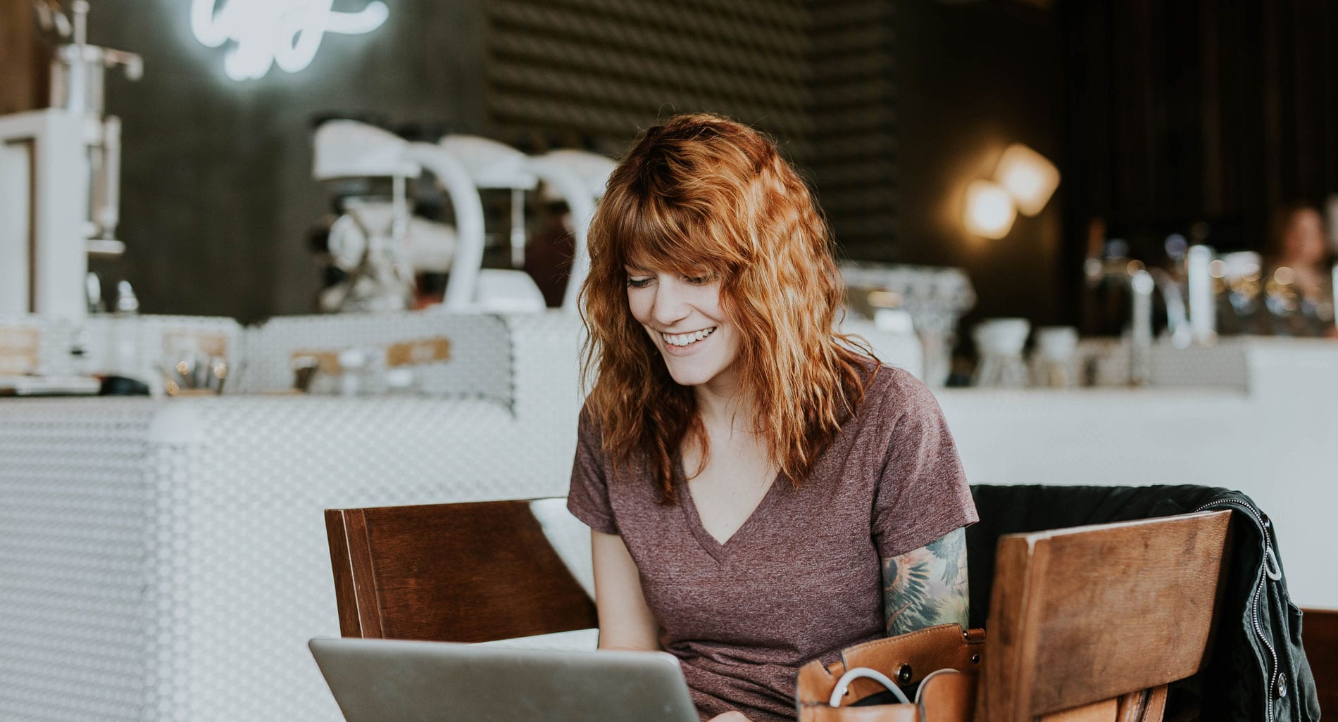 US/UI Design Header of Woman in a Coffee Shop